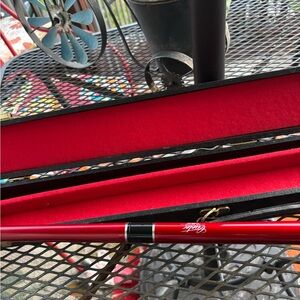 Red and Black Metallic Pool Stick with Sleek Accents As-Is